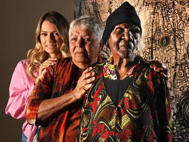 Tandanya turns 30 with exhibition from Utopia region of NT, same area as its first show 30 years ago. Three generations - Jade Torres (27), Barbara Weir 80 and Emily Pwerle (97), on the 1st Octorber, 2020. Picture: Tricia Watkinson*Barbara Weir is Jades grandmother. Barbara's mother is Minnie Pwerle and Emily Pwerle is Minnie's sister, so Emily is Barbara's aunty and her mothers sister.