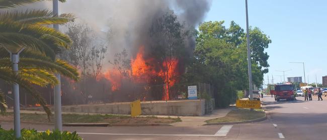 The fire broke out in a building right next to Darwin’s tallest high-rise, above and below. Pictures: Michael from Evolution