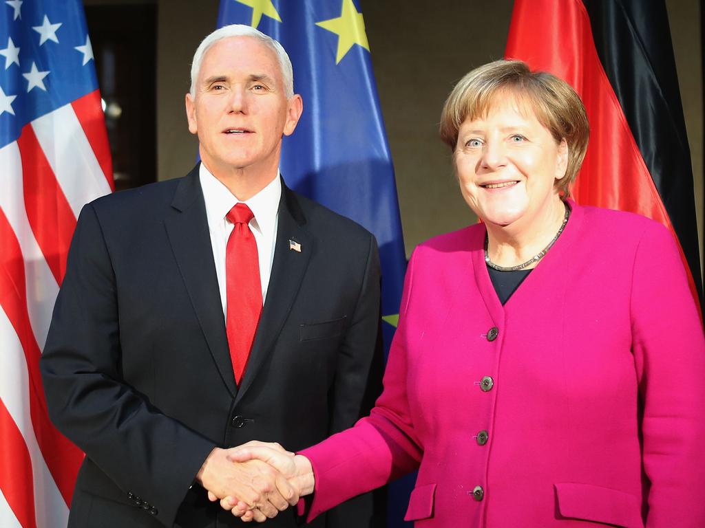 German Chancellor Angela Merkel (R) warned US vice president Mike Pence that a US pullout will boost the role of Russia and Iran in Syria. Picture: Alexandra Beier/Getty Images