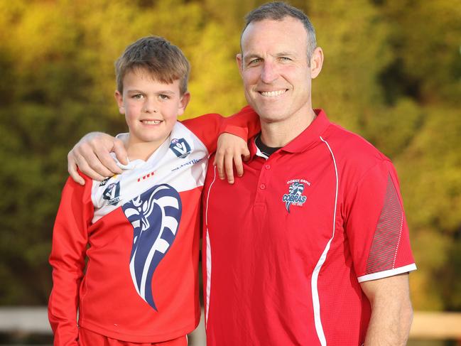 Former Cats Premiership player, and current Cats ruck coach Brad Ottens is coaching his son Johnny's u9 Ocean Grove team Picture: Alison Wynd