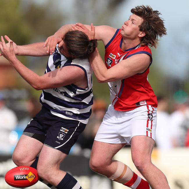 Congupna’s Sam Buxton grabs Finley’s Lachlan Hawkins high.