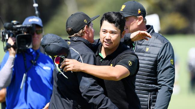 Cameron Smith congratulates Hideki Matsuyama after the Japanese star beat Patrick Reed.