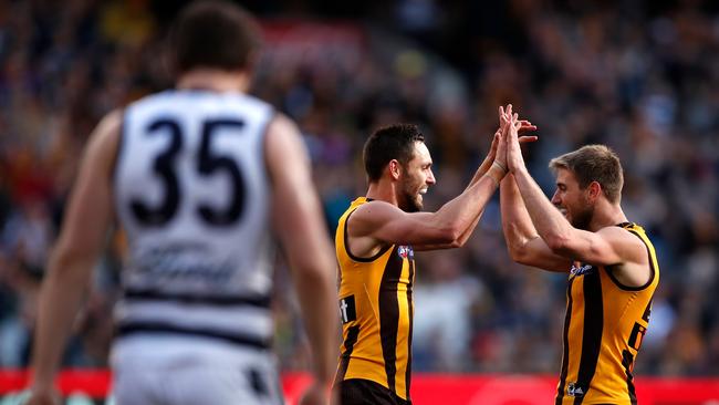 Jack Gunston of the Hawks celebrates a goal with Ryan Schoenmakers against Geelong on Saturday. Picture: Adam Trafford/AFL Media/Getty Images