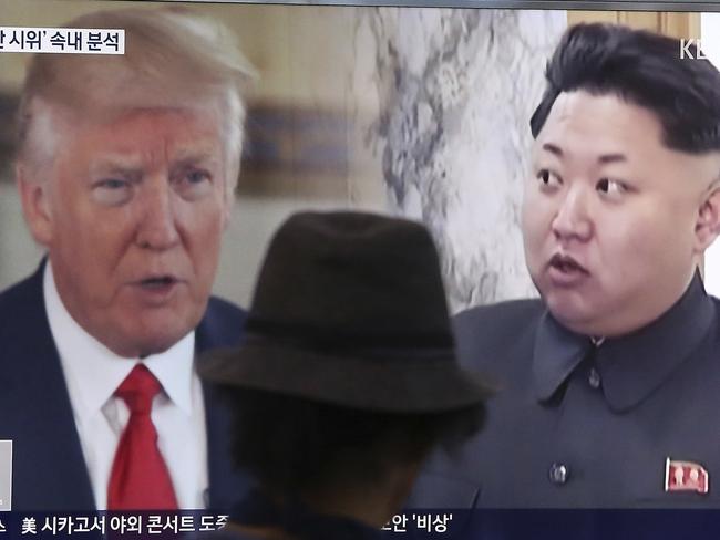 A man watches a television screen showing U.S. President Donald Trump and North Korean leader Kim Jong Un in Seoul, South Korea. A spokesman for South Korea has said that North Korea should stop provocations that would “lead to its own isolation and demise”. Picture: AP Photo/Ahn Young-join