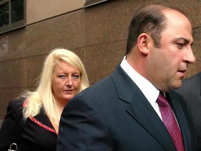 Nicola Gobbo follows Tony Mokbel into a Melbourne court.