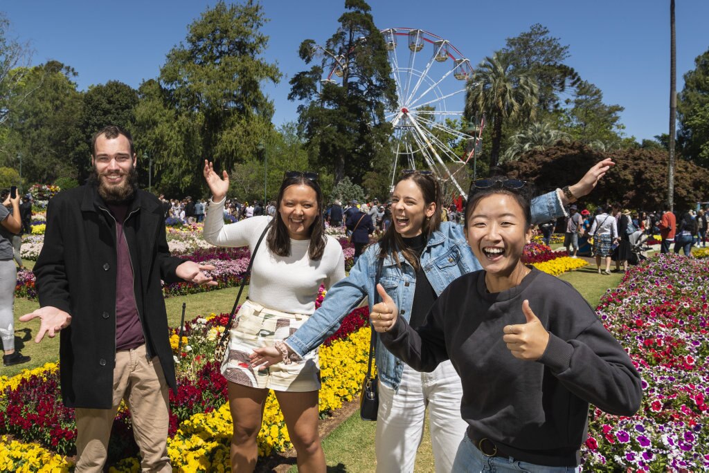 Brisbane visitors (from left) Bryce Unwin, Keely Lynch, Kate Doherty and Kathy Kwan in Queens Park during Carnival of Flowers 2020, Saturday, September 26, 2020. Picture: Kevin Farmer