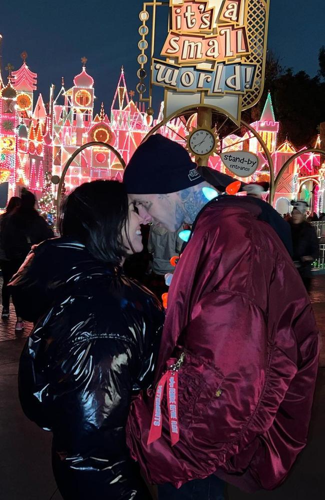 Kourtney and Travis at Disneyland.