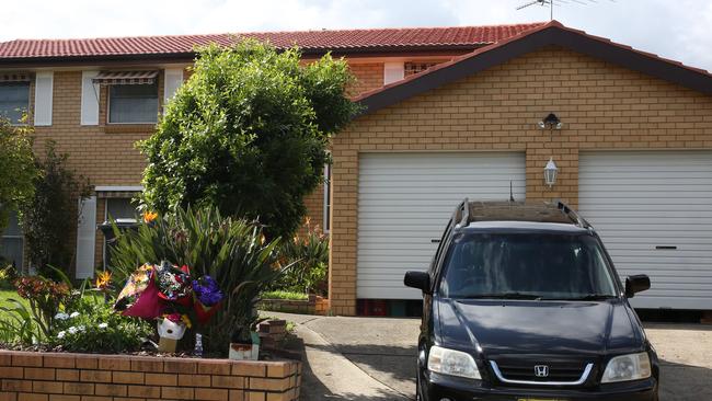 A floral tributes at the Glenfield home of murder victim Brayden Dillon.