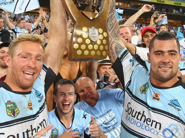 SYDNEY, AUSTRALIA - OCTOBER 02:  Matt Prior and Andrew Fifita of the Sharks celebrate with the trophy after victory in the 2016 NRL Grand Final match between the Cronulla Sharks and the Melbourne Storm at ANZ Stadium on October 2, 2016 in Sydney, Australia.  (Photo by Mark Kolbe/Getty Images)