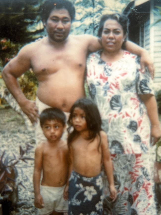 Horace and Gideon Uelese with their parents in their junior years.