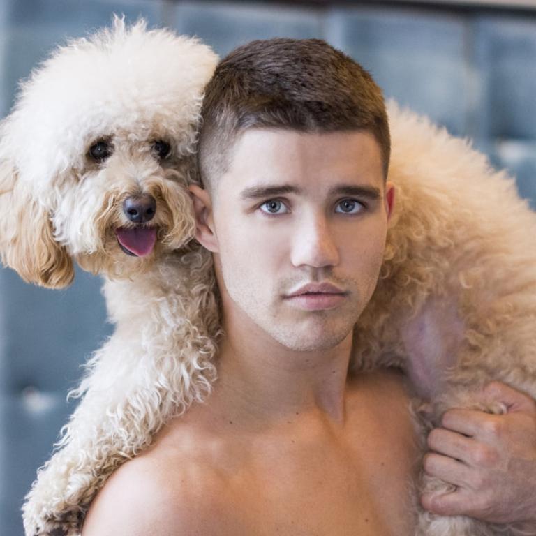 With the tagline, “These dudes will make you drool more than man’s best friend”, the Hot Dudes with Dogs calendar tells it as it is. While the model here perfects Zoolander’s Blue Steel gaze, the small sheep he has hoisted on his shoulders steals the show.