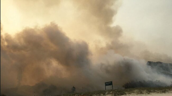 Authorities have advised anyone still in the Happy Valley area to leave the area immediately via the beach's southeastern exit and proceed south to the Eurong township. (PICTURES COURTESY OF QAS)