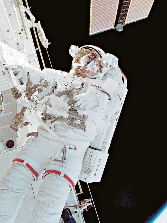 Dr Andy Thomas making his first space walk in 2001 Picture: NASA