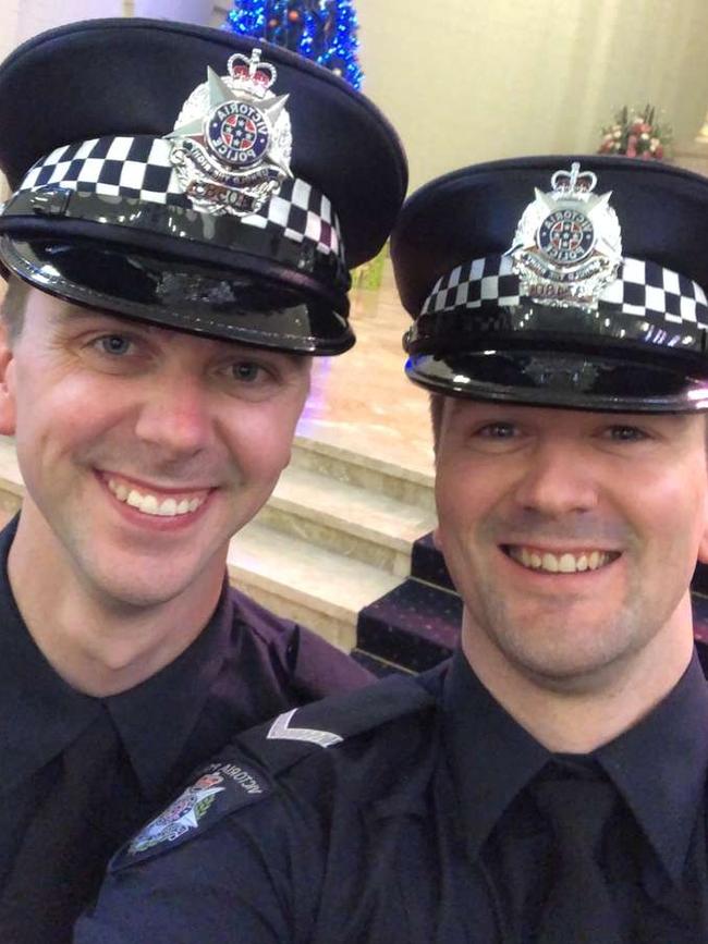 Josh and Alex on Josh's police academy graduation day.