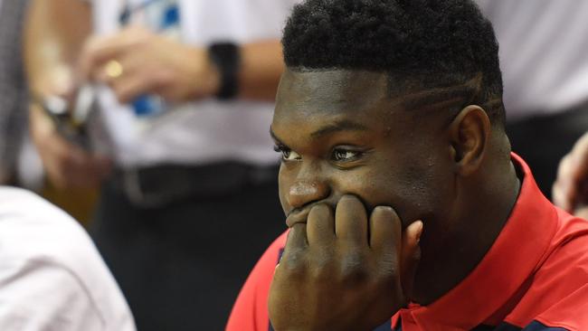 LAS VEGAS, NEVADA - JULY 06: Zion Williamson #1 of the New Orleans Pelicans sits on the bench before a game against the Washington Wizards during the 2019 NBA Summer League at the Thomas & Mack Center on July 6, 2019 in Las Vegas, Nevada. NOTE TO USER: User expressly acknowledges and agrees that, by downloading and or using this photograph, User is consenting to the terms and conditions of the Getty Images License Agreement.   Ethan Miller/Getty Images/AFP == FOR NEWSPAPERS, INTERNET, TELCOS & TELEVISION USE ONLY ==