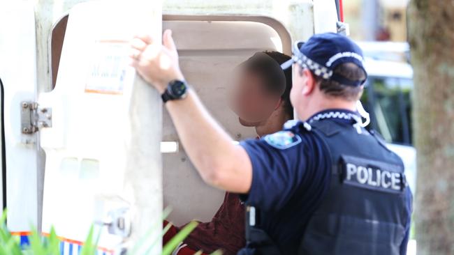 Police officers arrest a man on Lake Street and have charged him with theft from the Alive Pharmacy. Picture: Brendan Radke