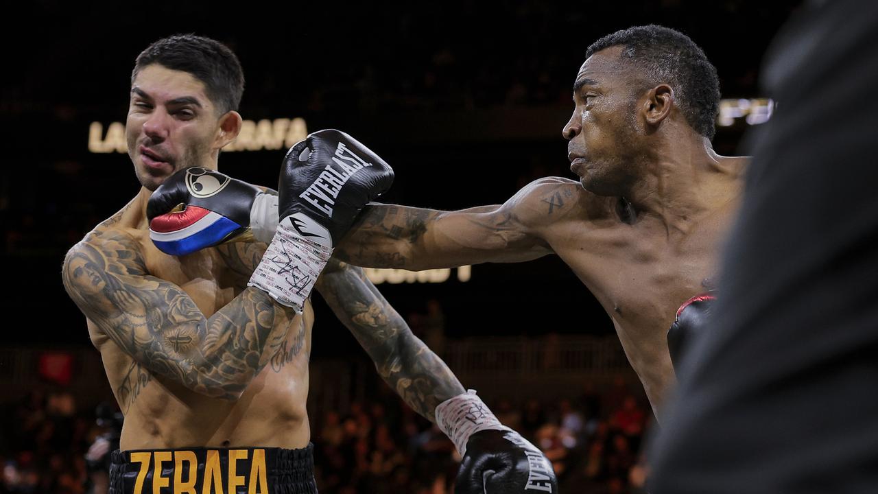 Erislandy Lara (right) was far too strong for Zerafa in their title showdown. Picture: PBC