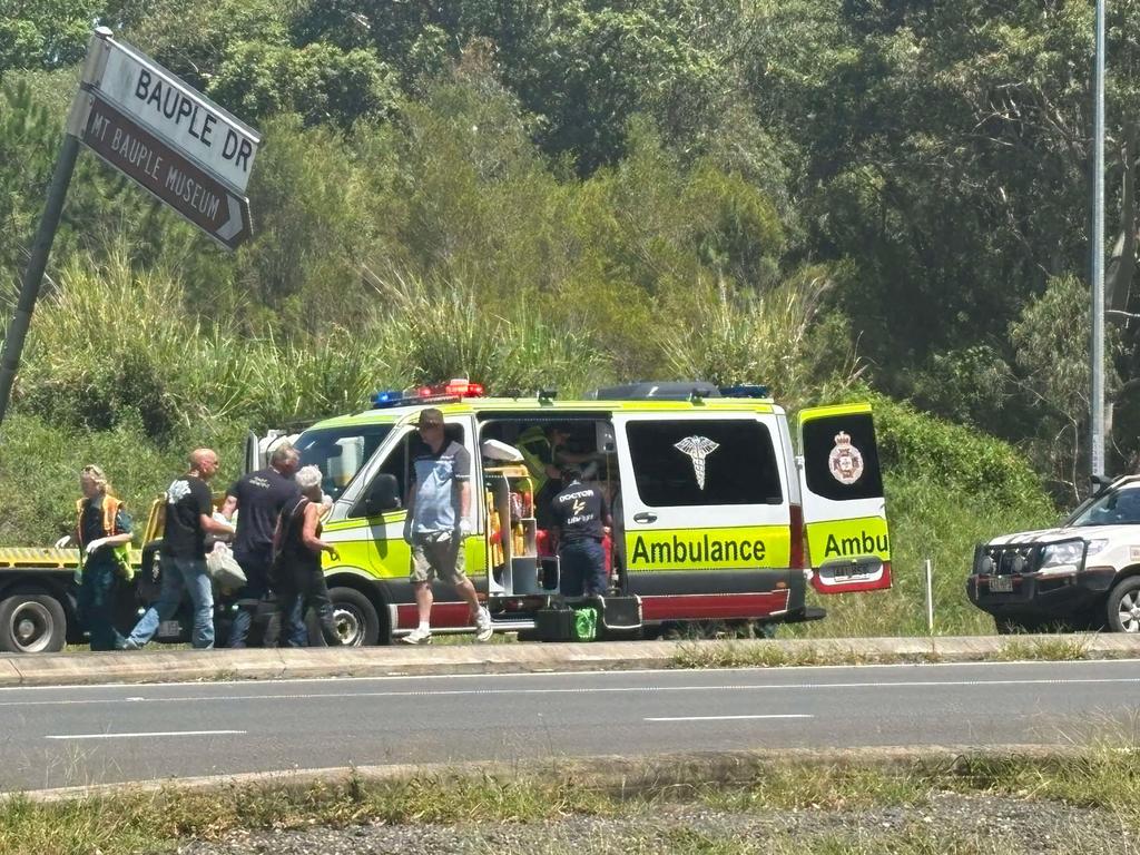 The woman has been loaded into the ambulance.