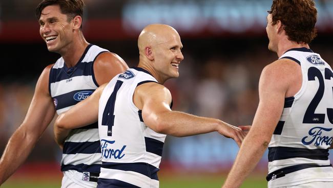 A happy Gary Ablett with Tom Hawkins and Gary Rohan. Picture: Michael Klein