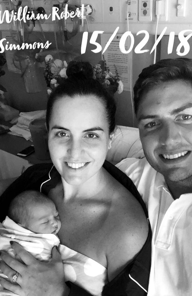 NSW Waratahs player Rob Simmons with his partner and new baby.