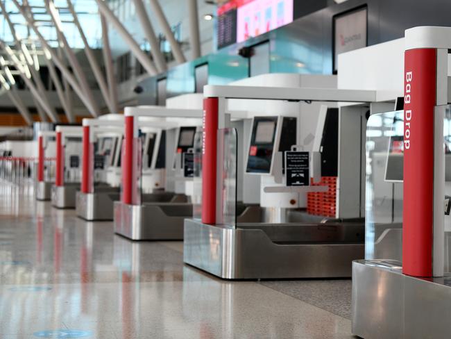 A deserted bag drop area at the Qantas terminal at Sydney Airport. Picture: AAP