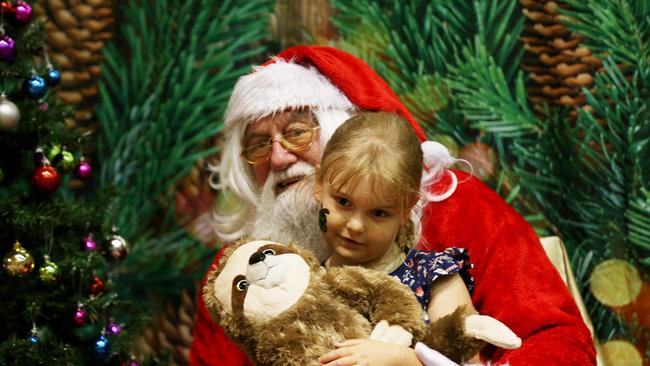 Santa with Alex McCracken, 5, from Bentley Park. PICTURE: STEWART MCLEAN