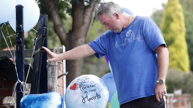 Heartbroken father Joseph Shorey reads messages from the community. Picture: Jonathan Ng