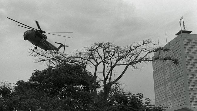 A US Marines helicopter lifts off from the landing pad atop the US Embassy during the evacuation of Saigon on April 30, 1975