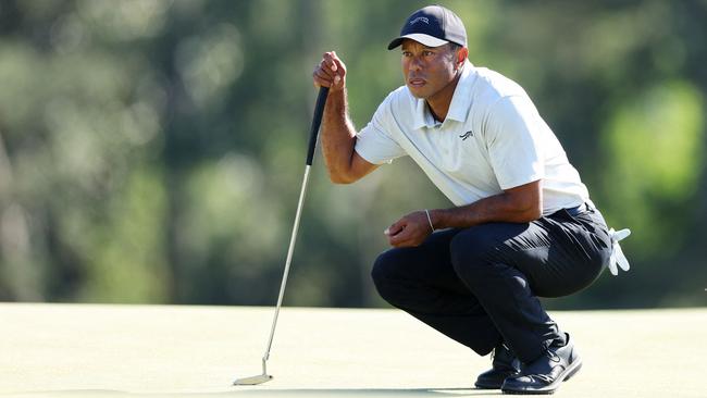 Tiger Woods lines up a putt on the 18th green during the third round – the former champion’s worst at the Masters. Picture: Andrew Redington/Getty Images/AFP