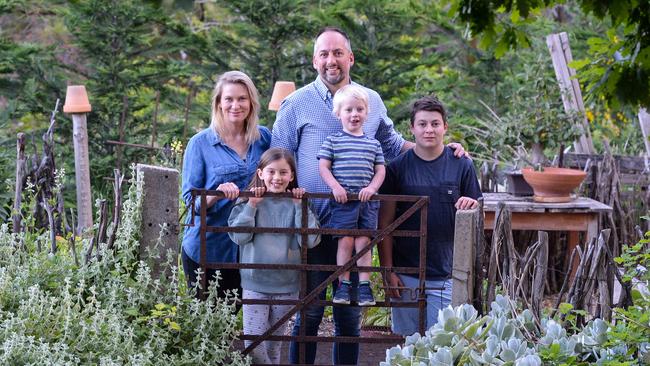 Passionate gardener Brenton Roberts with his wife Libby and children Billy, Maya and Lachlan, and dog Thorby at their Aldgate property, which appears at number three on our list. Picture: Brenton Edwards