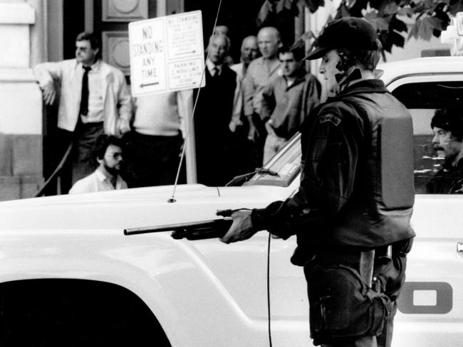 Armed police on Queen St after the shooting. Picture: Gillianne Tedder