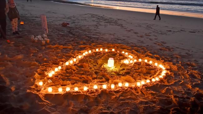 Candles were lit for Justine Ruszczyk on the anniversary of her death. Picture: AAP IMAGE/Troy Snook