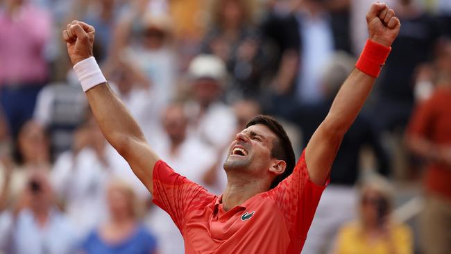 Novak Djokovic of Serbia celebrates winning match point against Casper Ruud of Norway in the Men's Singles Final match of the 2023 French Open at Roland Garros.