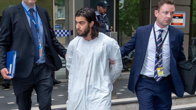 Hanifi Halis leaves the AFP offices in Melbourne. Picture: Jay Town