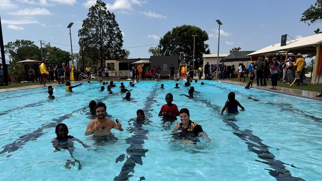 Natasha Fyles enjoys the reopened pool with Wadeye locals.