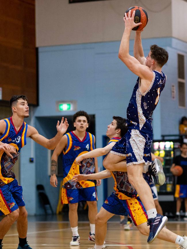 Ansett’s James Toohey attempts a jump shot in the paint against Tracy Village in Round 20 of the 2020 DBA Championship season. Picture: Che Chorley