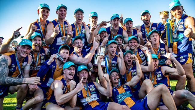 Golden Square celebrates its thrilling win over Sandhurst in the Bendigo league grand final at the QEO in 2023. Picture: SAA Imaging