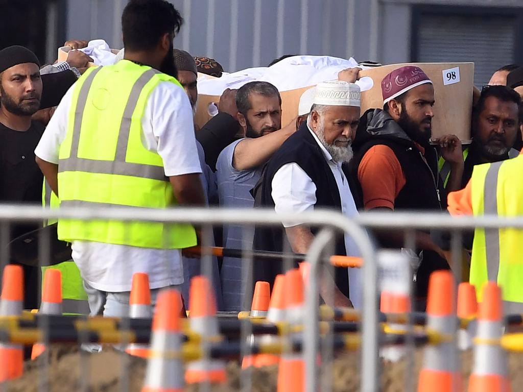 A Syrian refugee and his son were buried in New Zealand on March 20 in the first funerals of those killed in the twin mosque massacre as Kiwis braced for days of emotional farewells following the mass slayings. Picture: AFP