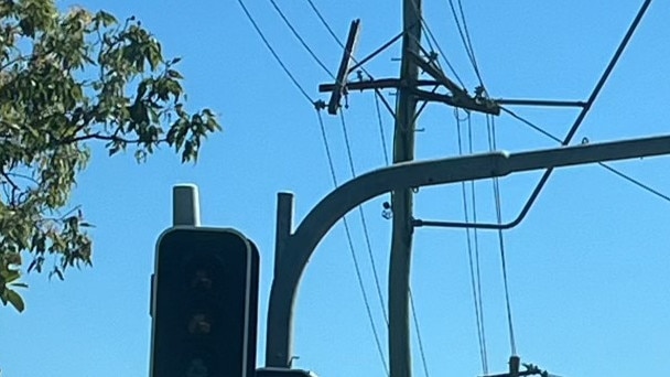 A cross arm on a power pole was damaged after a car crashed into a powerpole on Feez St in Norman Garden.