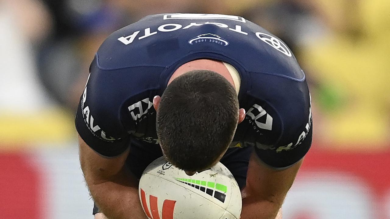 TOWNSVILLE, AUSTRALIA - MARCH 18: Chad Townsend of the Cowboys holds his knee after being injured during the round three NRL match between North Queensland Cowboys and New Zealand Warriors at Qld Country Bank Stadium on March 18, 2023 in Townsville, Australia. (Photo by Ian Hitchcock/Getty Images)