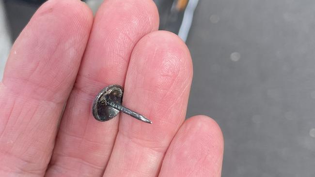 Community members and police have recovered hundreds of tacks, nails and screws, believed to have been deliberately placed on the Northern Rivers Rail Trail between Murwillumbah and Mullumbimby. Picture: NSW Police