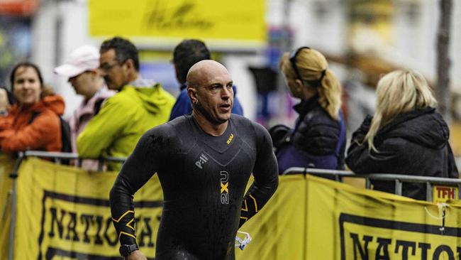 Athletes return from the swimming leg of the Ironman 70.3 Tasmania in Hobart on Sunday 4th February. Picture: Linda Higginson