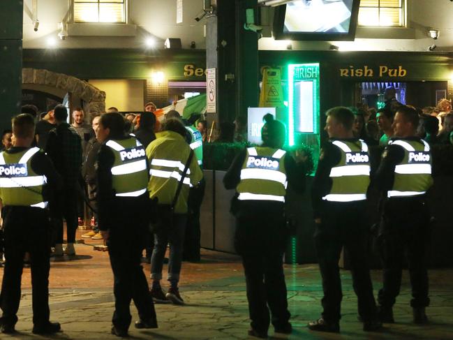 Police monitor the crowd around 11:30pm.