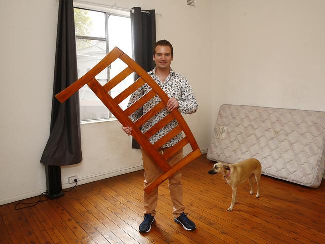 Vet Sam Kovac with dog Meika in one of the rooms above his Vet clinic, ready to be set up for temporary accommodation for bushfire victims. Picture: John Appleyard