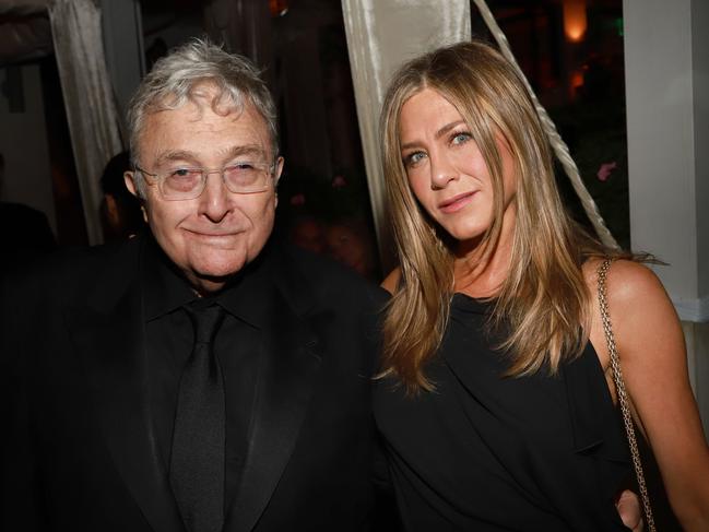 Randy Newman and Jennifer Aniston at Netflix’s Oscars party, held at San Vicente Bugalows. Picture: Getty Images