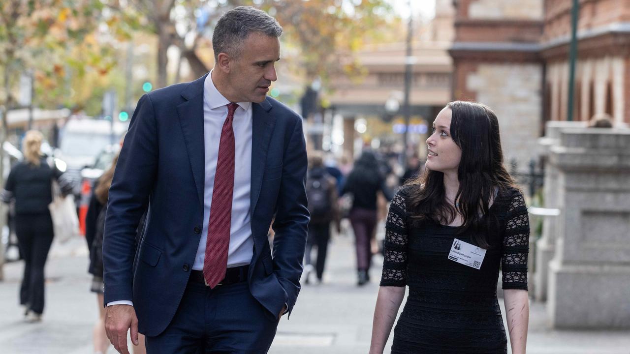 Chloe Wyatt-Jasper with Premier Peter Malinauskas on the steps of Parliament after the state government announced a range of youth mental health supports in the state budget. Picture: Kelly Barnes