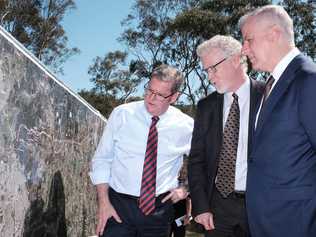 Groom MP Dr John McVeigh, ARTC Inland Rail Programme CEO Richard Wankmuller, and Deputy Prime Minister Michael McCormack look over plans for the Inland Rail.