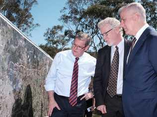 Groom MP Dr John McVeigh, ARTC Inland Rail Programme CEO Richard Wankmuller, and Deputy Prime Minister Michael McCormack look over plans for the Inland Rail.