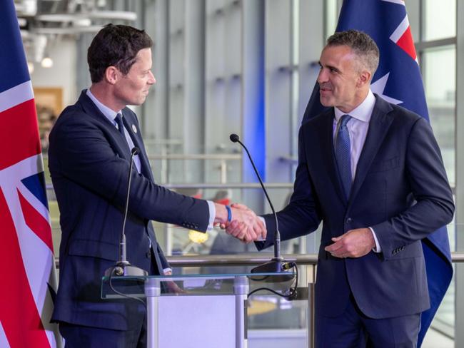 Premier Peter Malinauskas and UK Defence Procurement Minister Alex Chalk at the Barrow-in-Furness nuclear submarine shipyard operated by BAE Systems.