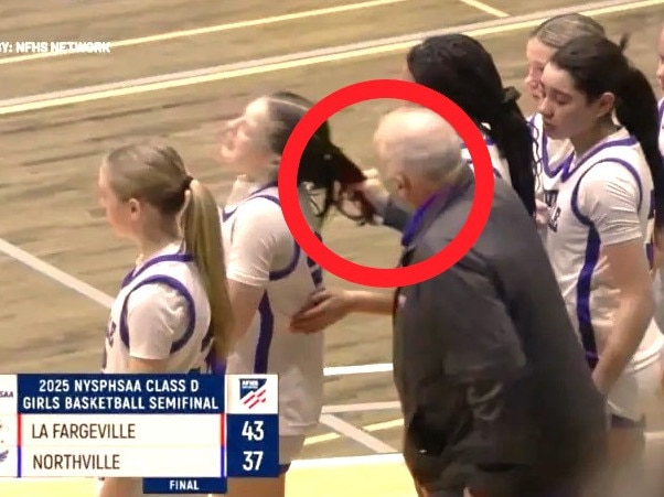 Coach Zullo continues berating Monroe after he yanked her hair. Photo: News10/NFHS Network.